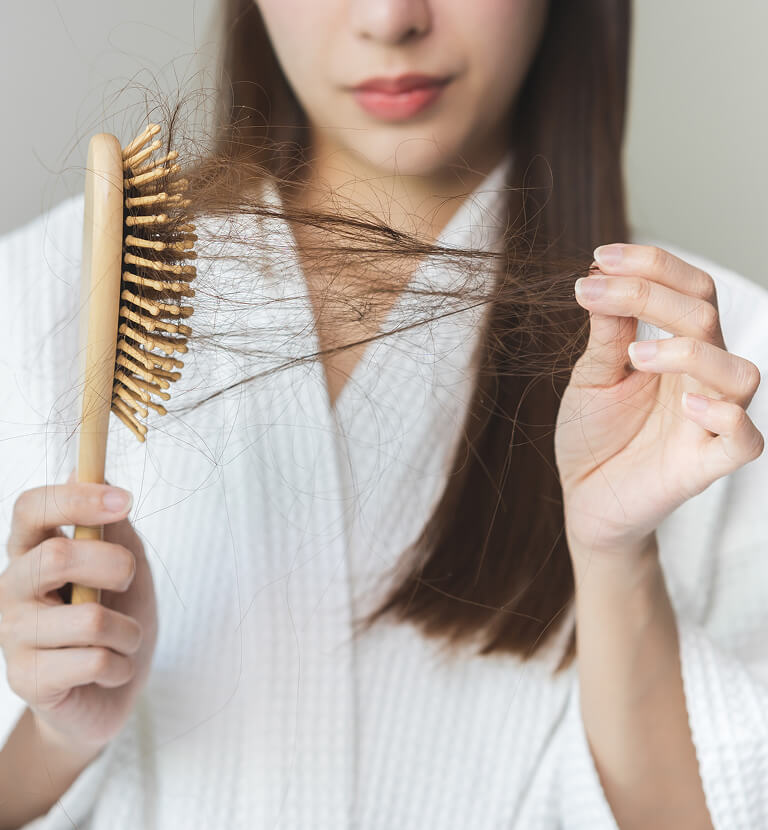 woman losing hair
